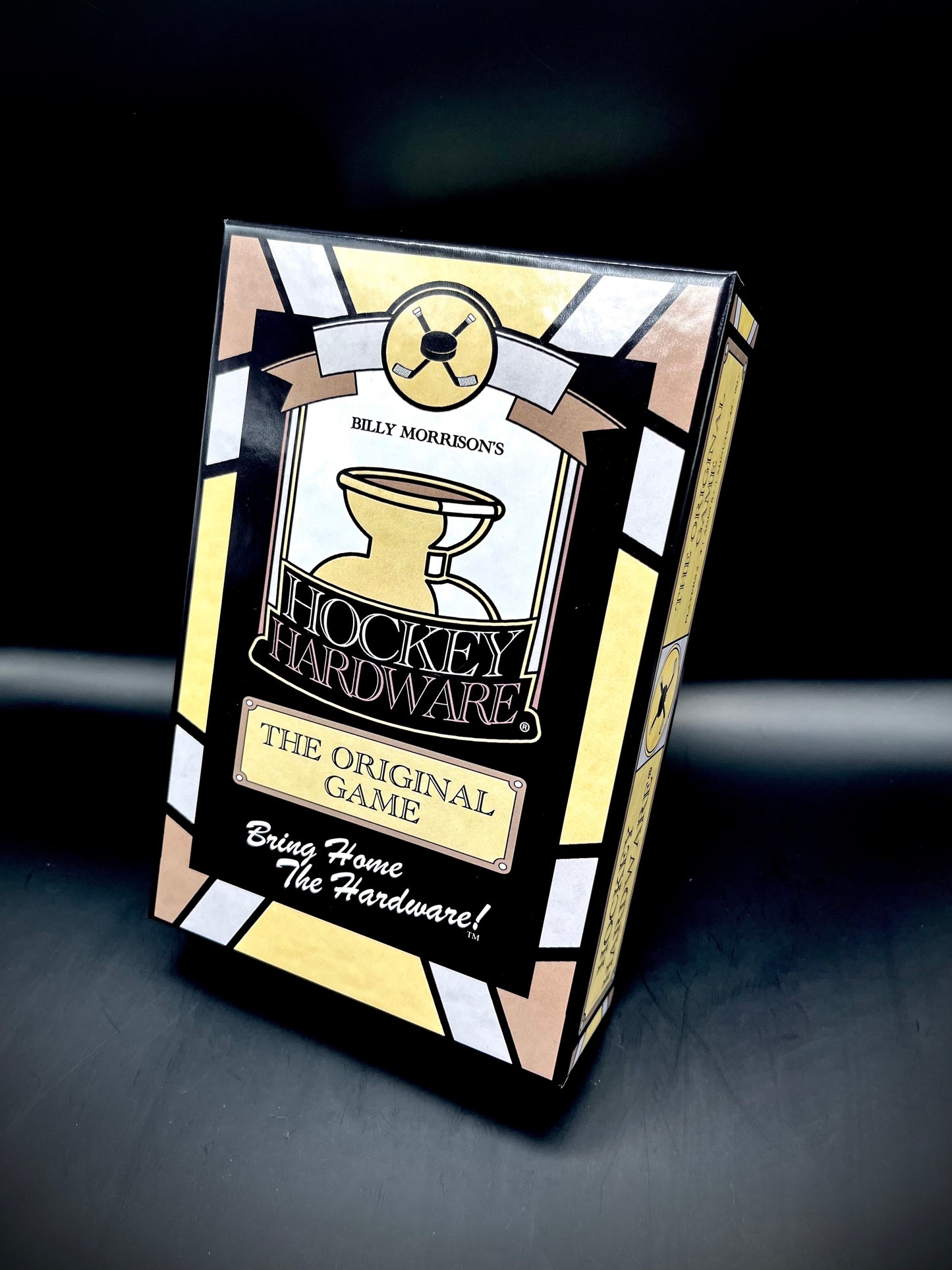 The front side of the Hockey Hardware game box, which is standing upwards on display.